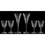 A suite of Waterford Lismore pattern drinking glasses, comprising eight flutes, six goblets,