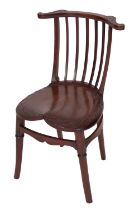 A carved mahogany child's chair in Arts & Crafts style,