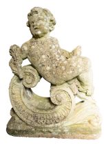 A pair of stone composition models of reclining putti, in Rococo style,