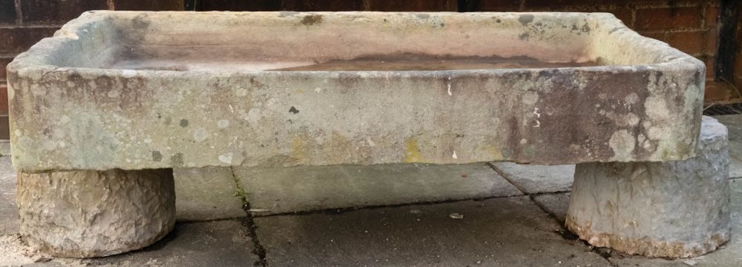 A rough hewn limestone trough, 18th / 19th century; of rectangular form,