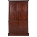 An Edwardian mahogany linen press, later refitted as a wardrobe,