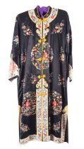 A Chinese hand-embroidered black silk robe, with figural and floral decoration,