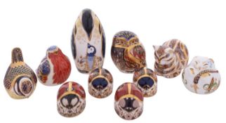 A group of ten Royal Crown Derby paperweights, comprising a penguin, owl, robin, blue tit, dormouse,