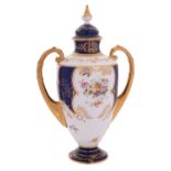A Coalport porcelain two-handled vase & cover painted with floral sprays and sprigs within gilded