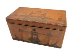 A George III Japanned and pen worked tea caddy, circa 1800; the hinged cover, front,