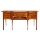 A Continental mahogany and marquetry serpentine front sideboard in late 18th century style;