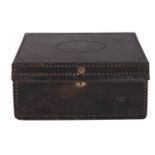 A leather covered and brass studded wood coaching trunk,