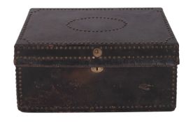 A leather covered and brass studded wood coaching trunk,