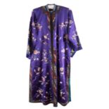 A Chinese hand-embroidered floral blue and purple silk robe,