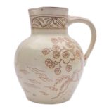 A North Devon slipware jug by Edwin Beer Fishley the cream slip sgraffito decorated with a sailing