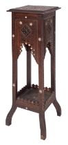 A Levantine carved hardwood and mother-of-pearl inlaid stand,