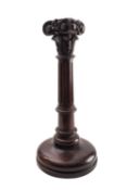 A carved and stained hardwood columnar table lamp,