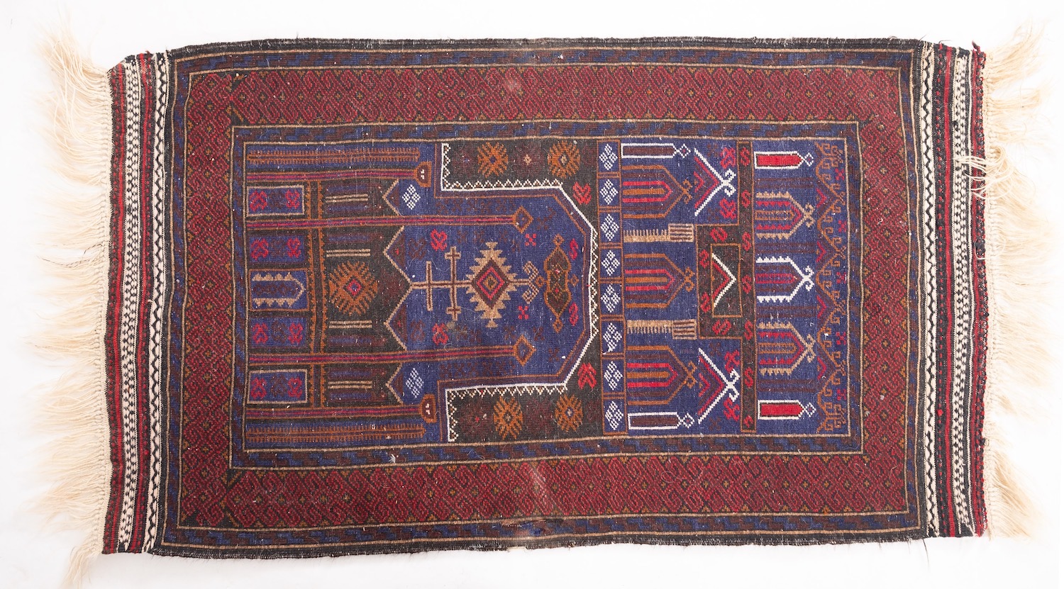 A Belouchistan rug, the indigo geometric field enclosed by a main wine lattice geometric border, - Image 2 of 4