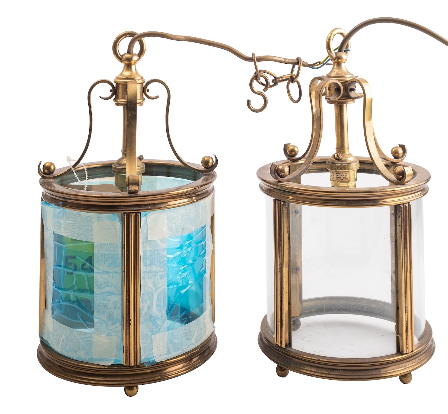 A pair of brass and glazed ceiling lanterns, in Regency taste,