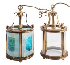 A pair of brass and glazed ceiling lanterns, in Regency taste,
