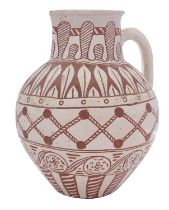 A North Devon slipware pottery harvest jug by William Fishley Holland the cream coloured slip