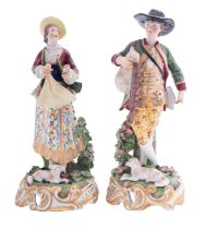 A pair of Continental porcelain figures modelled as a musician with a dog at foot,