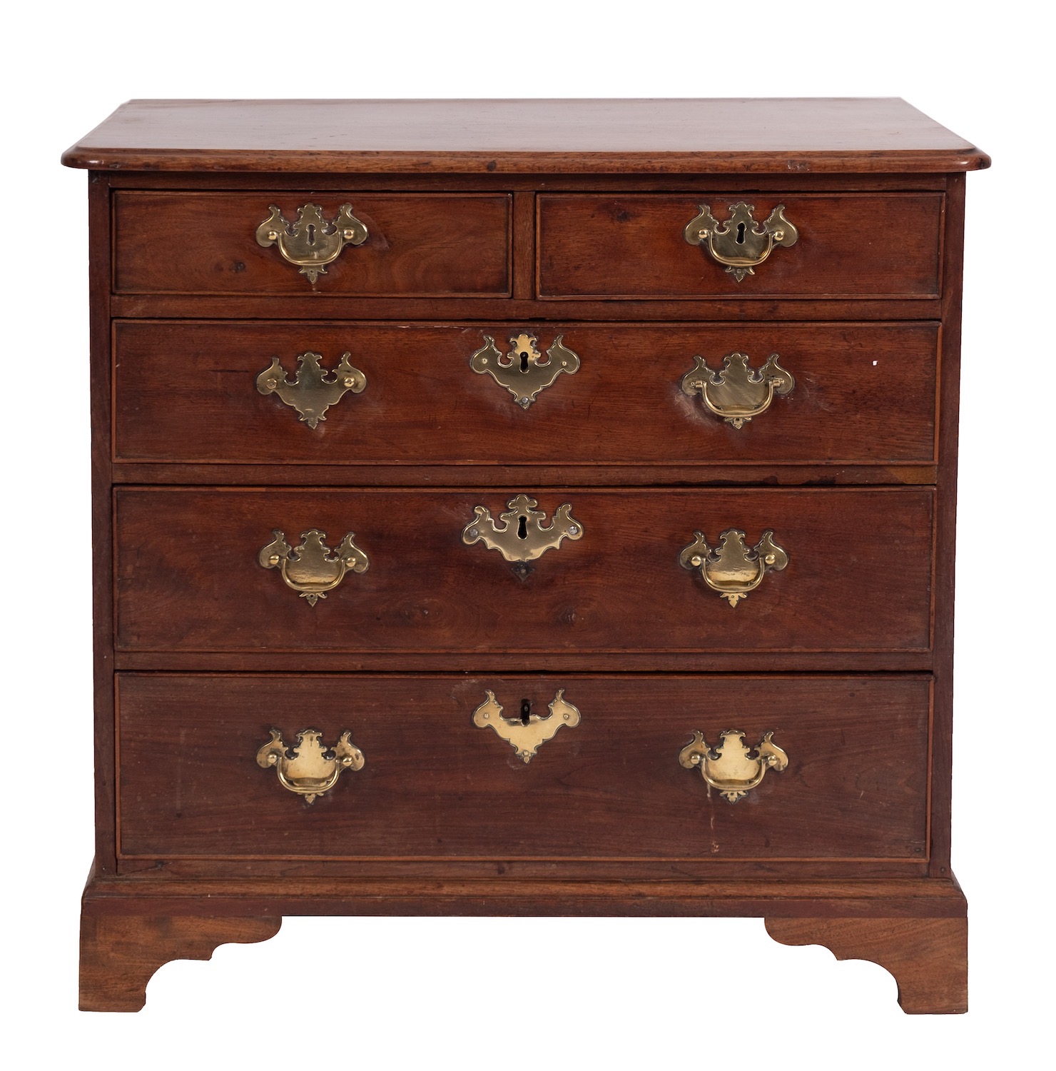 A George III stained mahogany chest of drawers, late 18th century; the top with moulded edges,