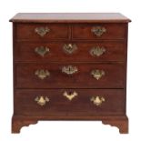 A George III stained mahogany chest of drawers, late 18th century; the top with moulded edges,