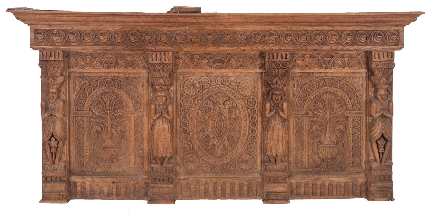 A carved oak overmantel in 17th century style,