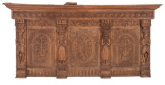 A carved oak overmantel in 17th century style,
