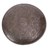 A Victorian patinated metal model of a circular shield,