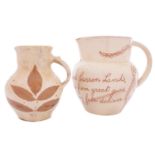 A North Devon slipware jug by Alexander Lauder and one other the first sgraffito decorated with a