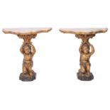 A pair of Italian marble topped, carved and giltwood console tables in Rococo style,