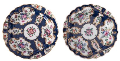 A pair of First Period Worcester plates with fluted rims,