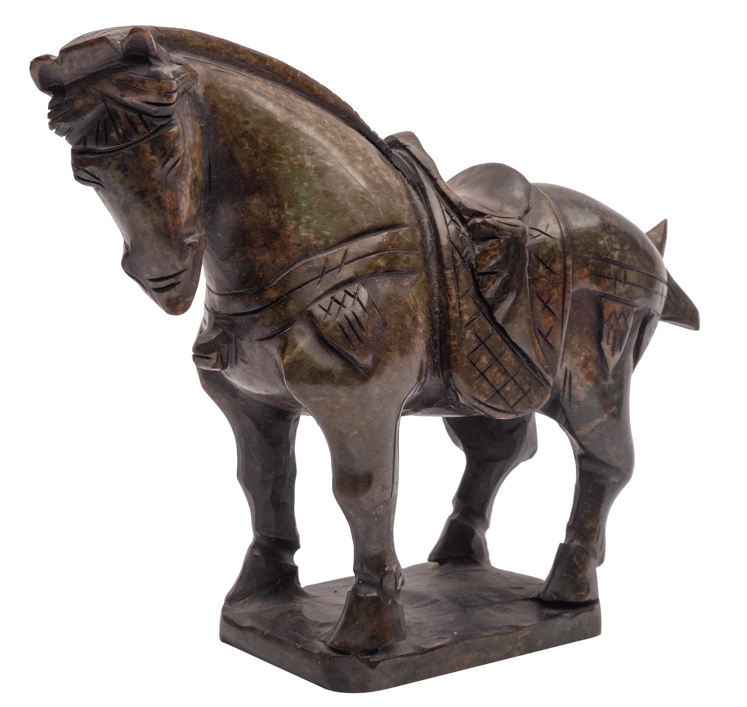 A Chinese carved jade model of a horse standing four-square with saddle and harness,