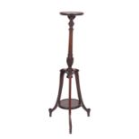 An Edwardian mahogany torchere or lamp stand,