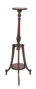 An Edwardian mahogany torchere or lamp stand,