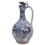 A Japanese Arita ewer of garlic shape with strap handle and pewter mounts,