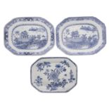 A pair of Chinese blue and white octagonal dishes and one similar the pair painted with pagodas and