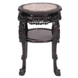 A Chinese carved and stained hardwood and marble topped stand,