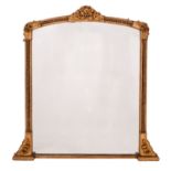 A Victorian carved and giltwood framed arched overmantel mirror,