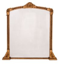A Victorian carved and giltwood framed arched overmantel mirror,