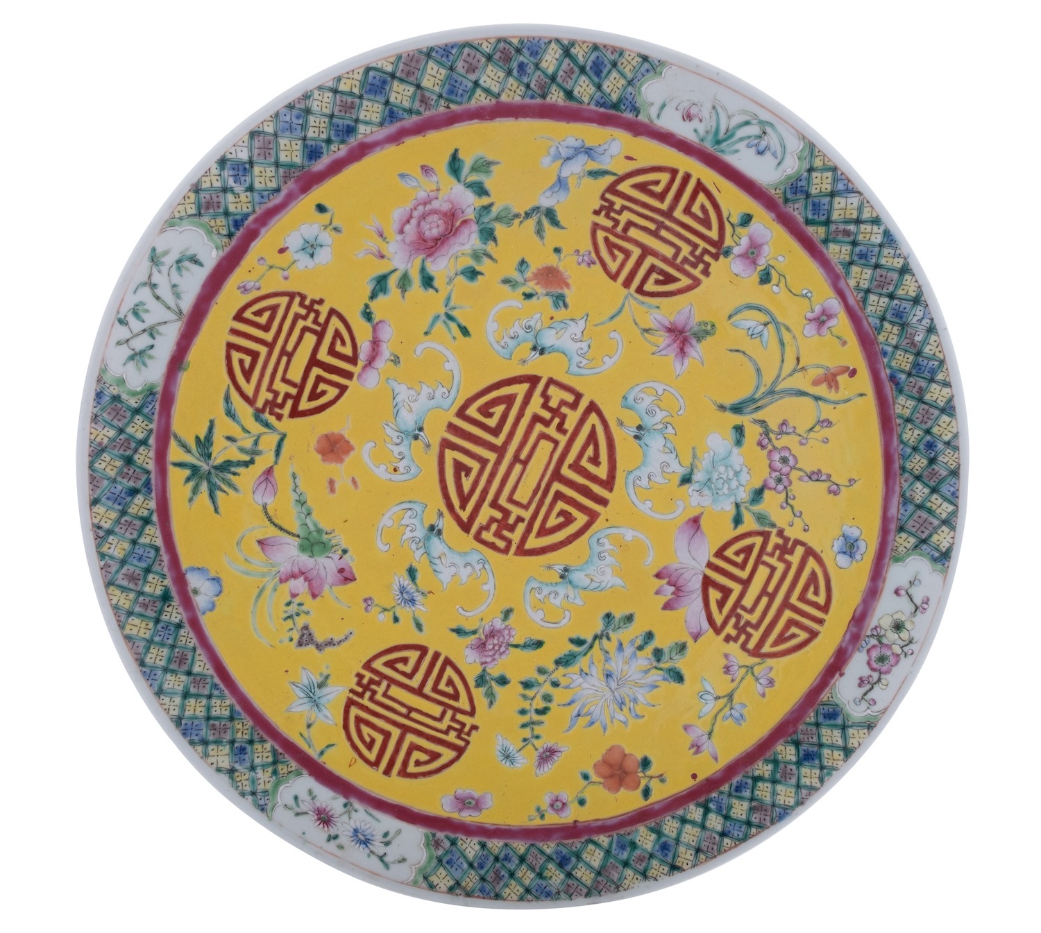 A Chinese yellow-ground famille rose charger painted with shou characters, bats,