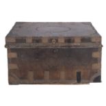 A George III brass bound and studded leather trunk,