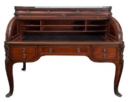 A mahogany and gilt metal mounted cylinder bureau with ormulu mounts in Louise XV Transitional