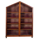 A Victorian oak and glazed bookcase in Gothic taste, late 19th century; of lancit form,