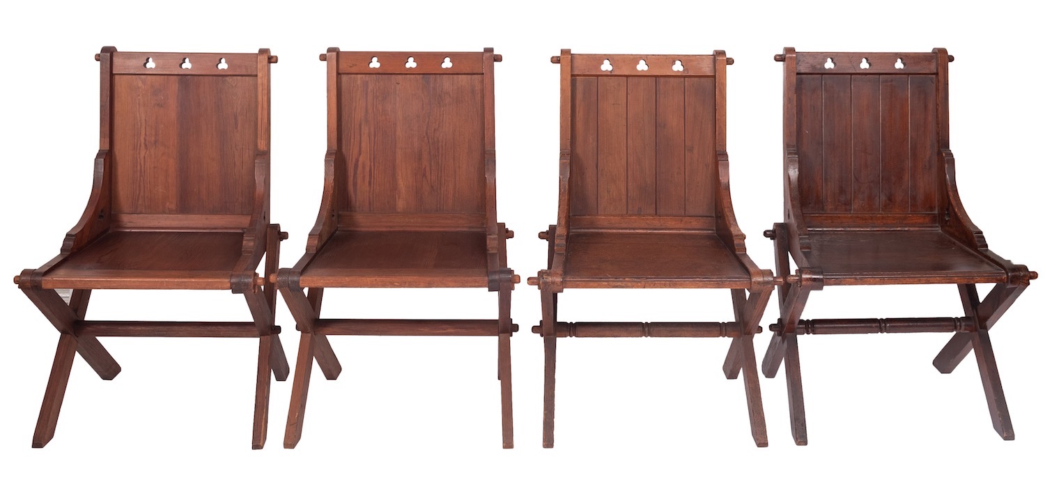 A set of four Victorian pitch pine Glastonbury chairs,