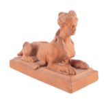 A Watcombe [Torquay] pottery Sphinx, modelled on a rectangular base,