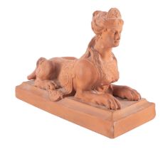A Watcombe [Torquay] pottery Sphinx, modelled on a rectangular base,
