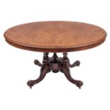 A Victorian walnut oval centre table,