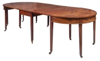 A George III mahogany extending dining table, circa 1800,