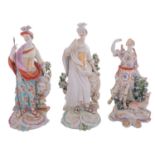A group of three Derby figures comprising two depicting Minerva, the goddess of Wisdom,
