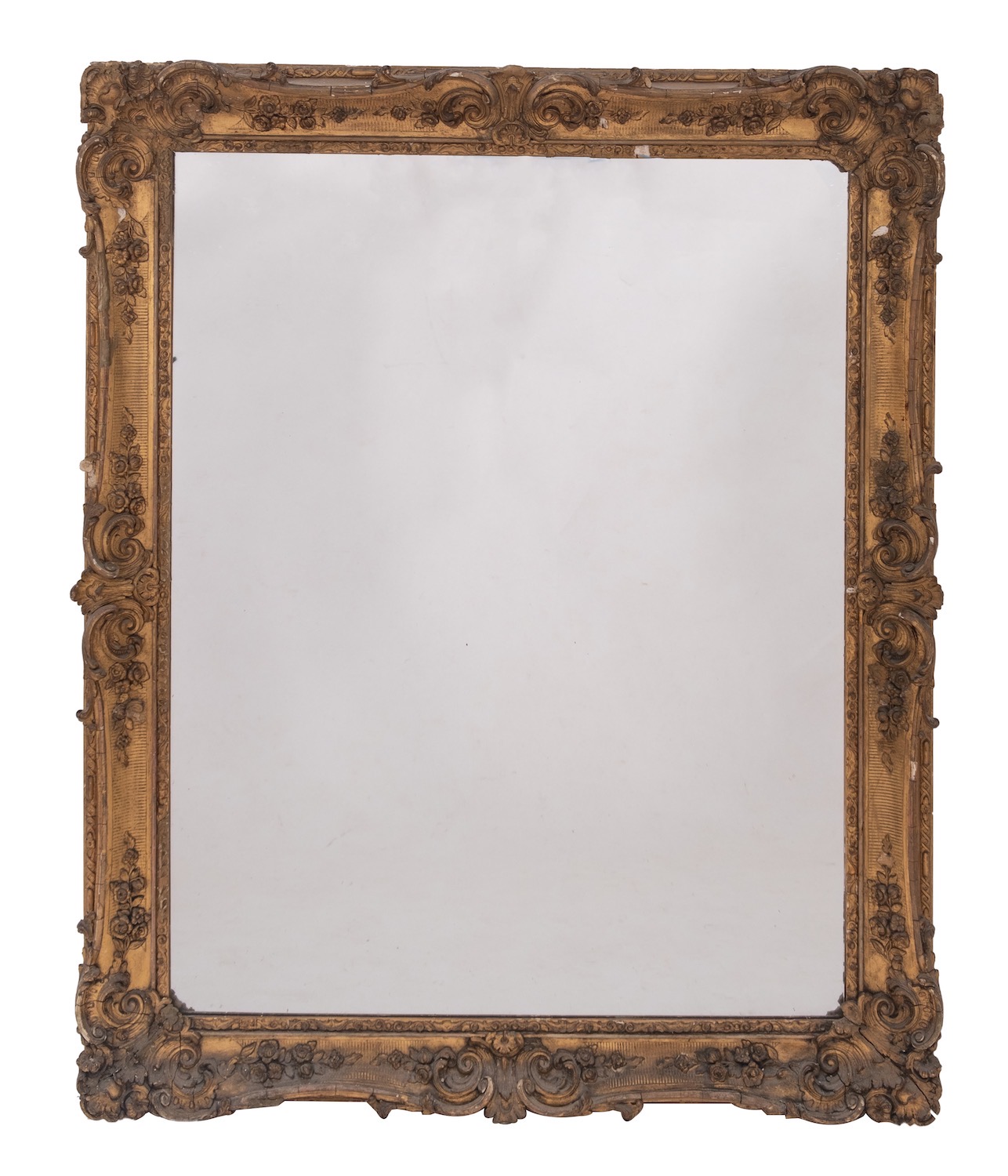 A Victorian carved giltwood and composition framed wall mirror in Rococo revival style,