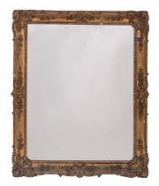 A Victorian carved giltwood and composition framed wall mirror in Rococo revival style,