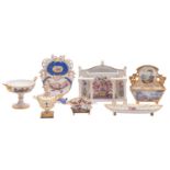 A group of early 19th century English porcelain including four letter/card racks, 6.